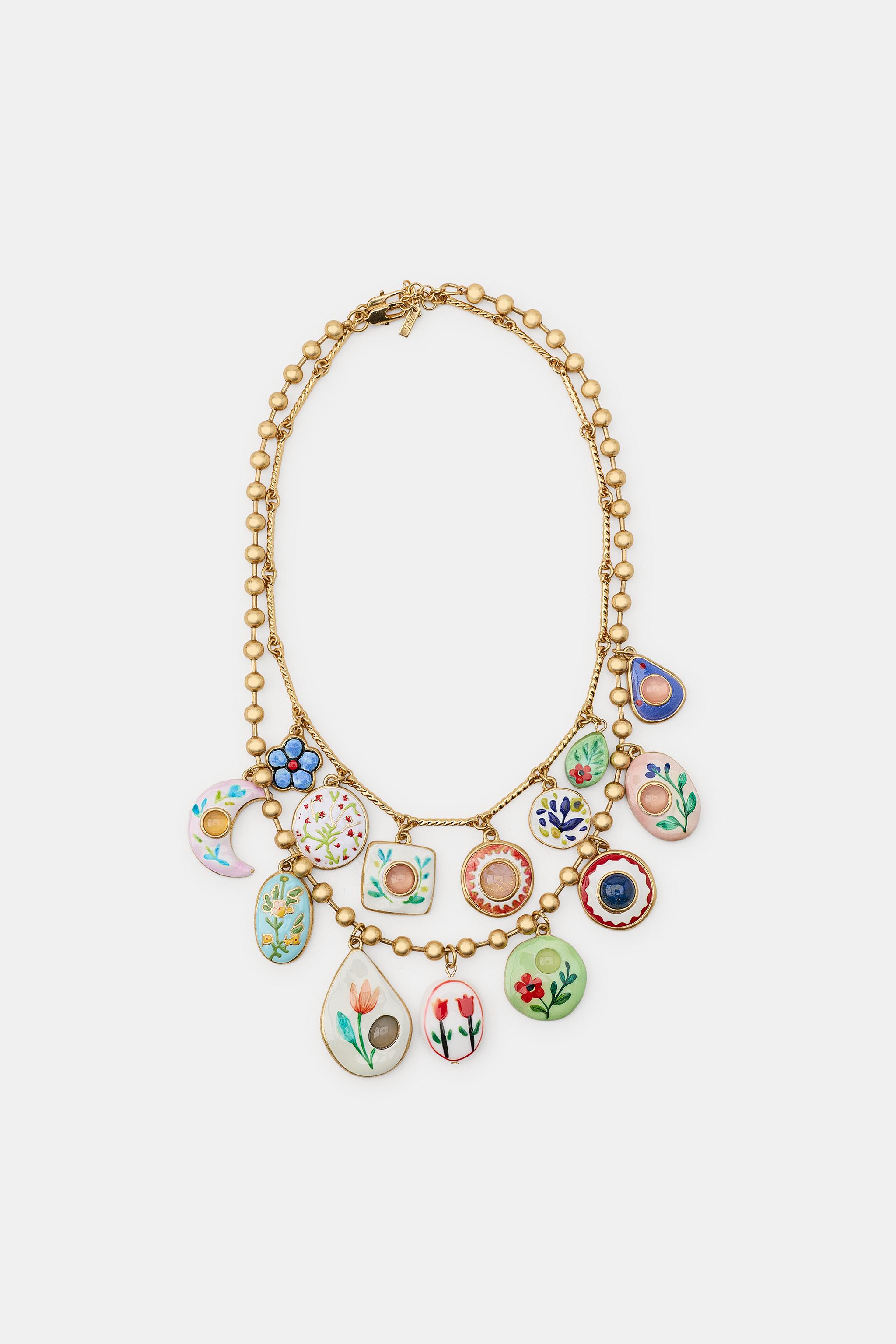 LOT DE 2 COLLIERS CHARMS RÉSINE